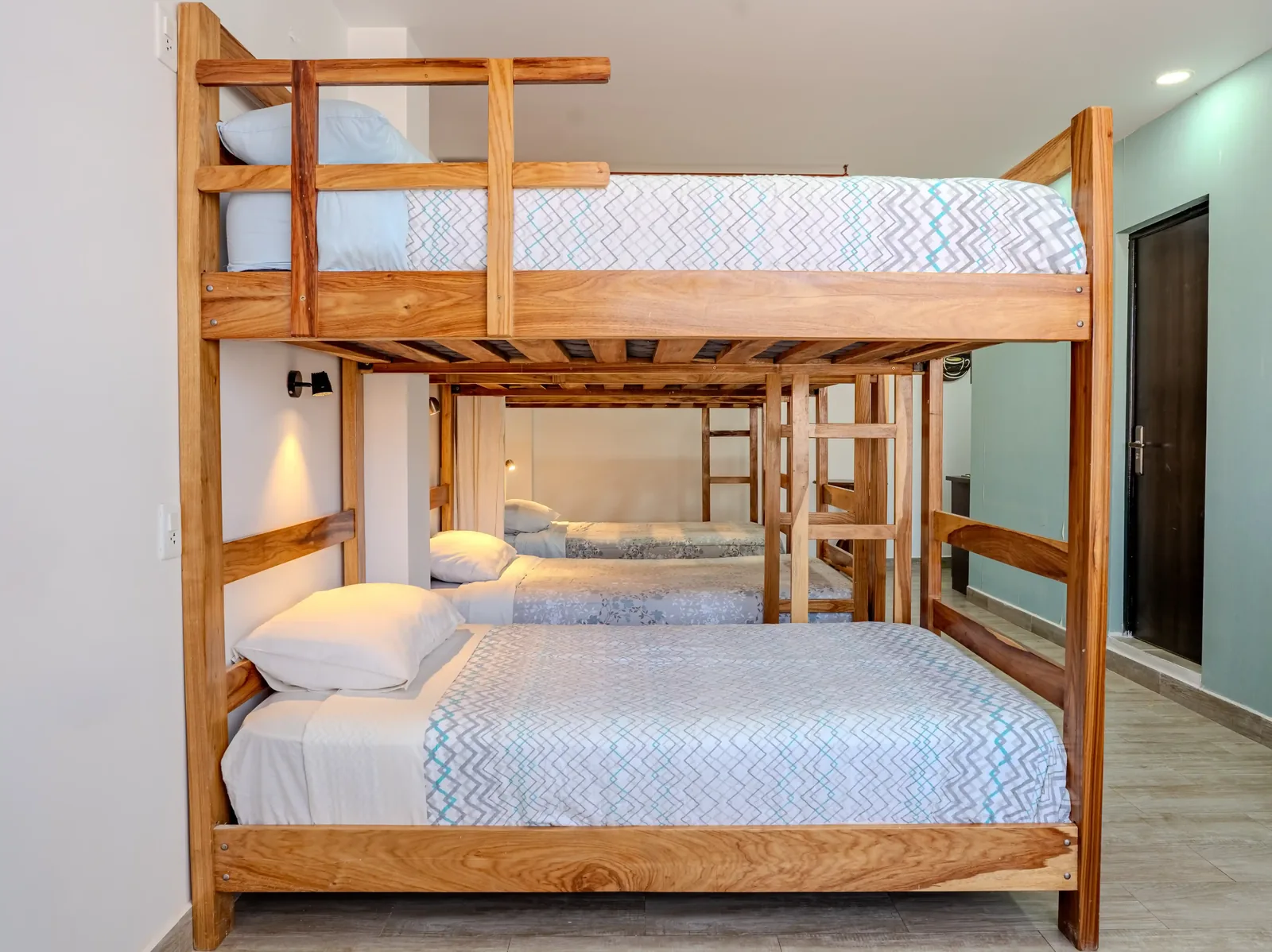 Clean and spacious dormitory bed in Sucre hostel lodging